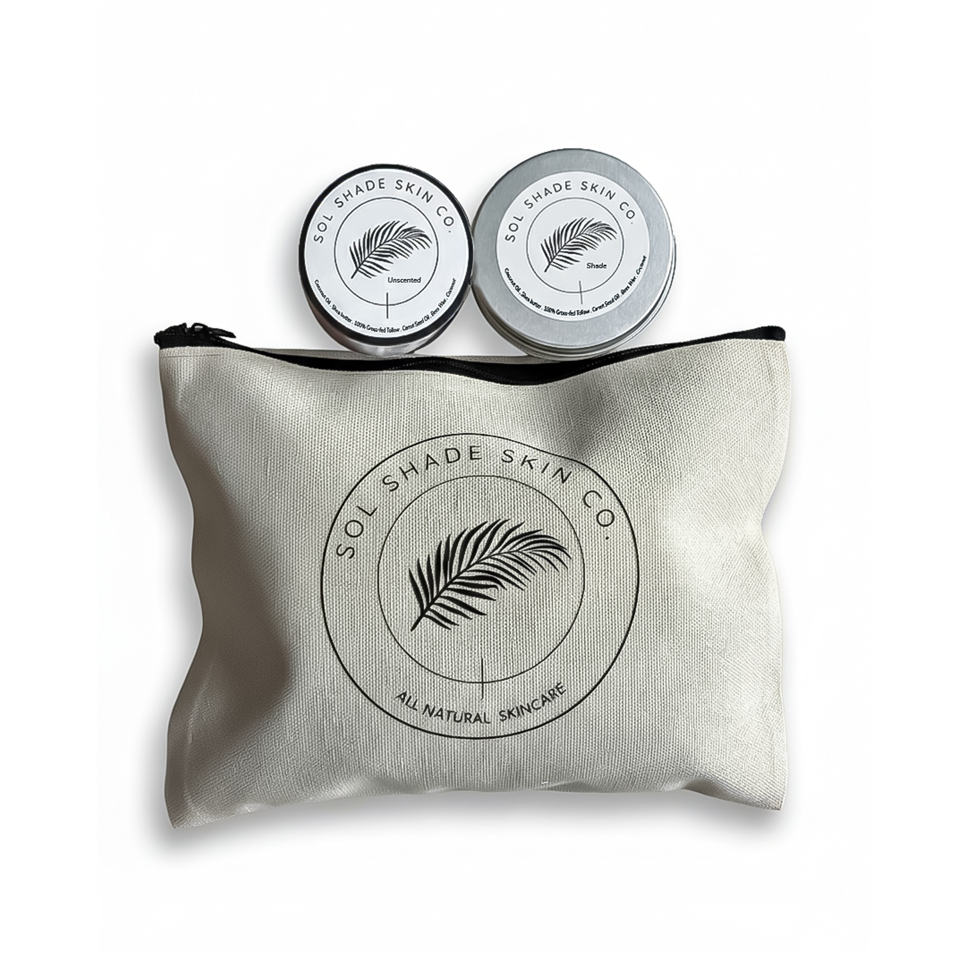 Two tins of Soothe Skin Co. product on a white pouch with the brand logo.
